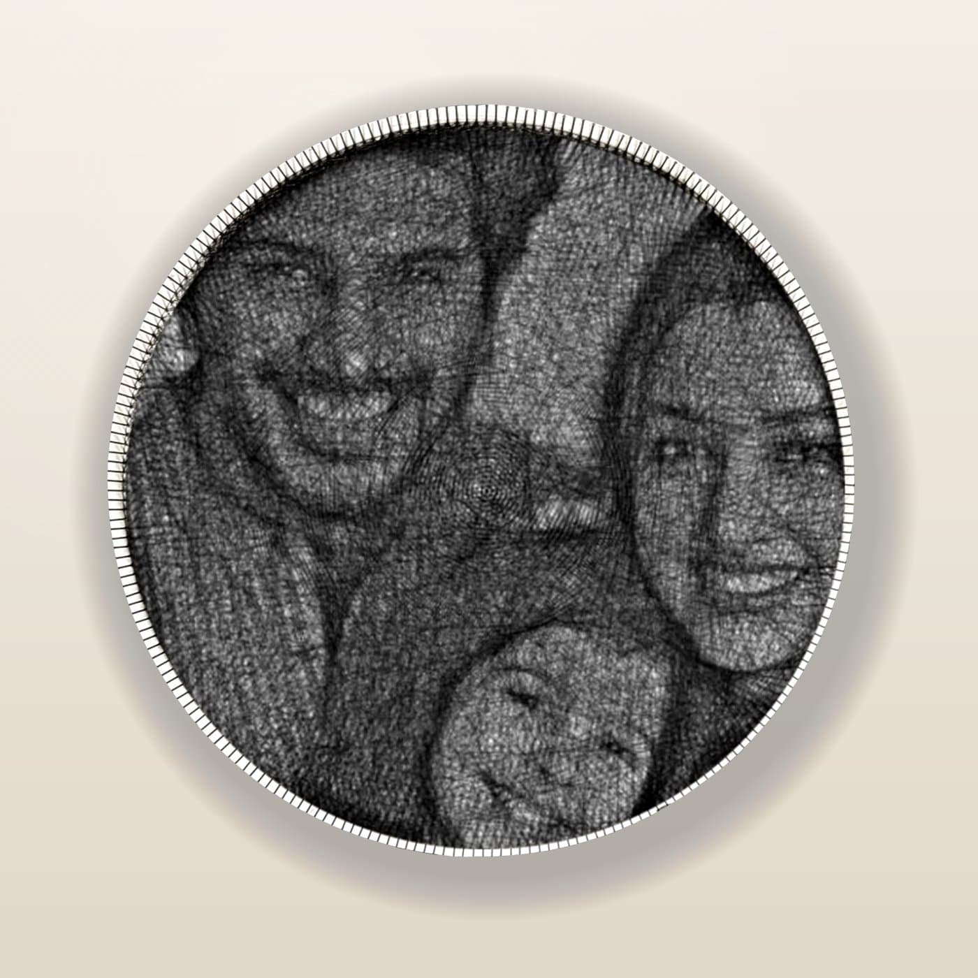 A family photo turned into a hand-threaded string-art portrait